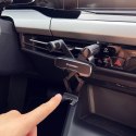 Uchwyt grawitacyjny na telefon na kratkę w samochodzie czarny