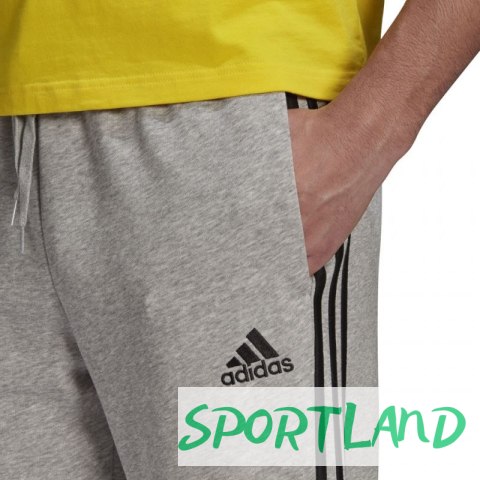Spodnie adidas Essentials Tapered Cuff 3 Stripes M GK8889 M Spodnie adidas Essentials Tapered Cuff 3 Stripes M GK8889 M