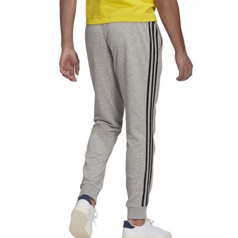 Spodnie adidas Essentials Tapered Cuff 3 Stripes M GK8889 L Spodnie adidas Essentials Tapered Cuff 3 Stripes M GK8889 L